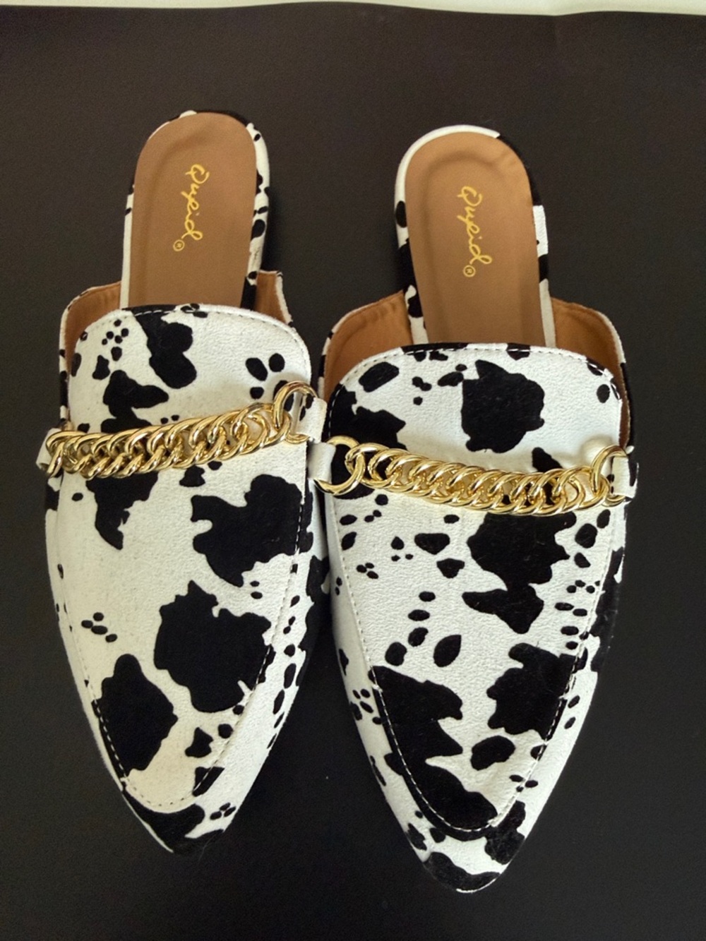 Qupid Black & White Cow Print Pointed Slip-On Mules with Gold Chain